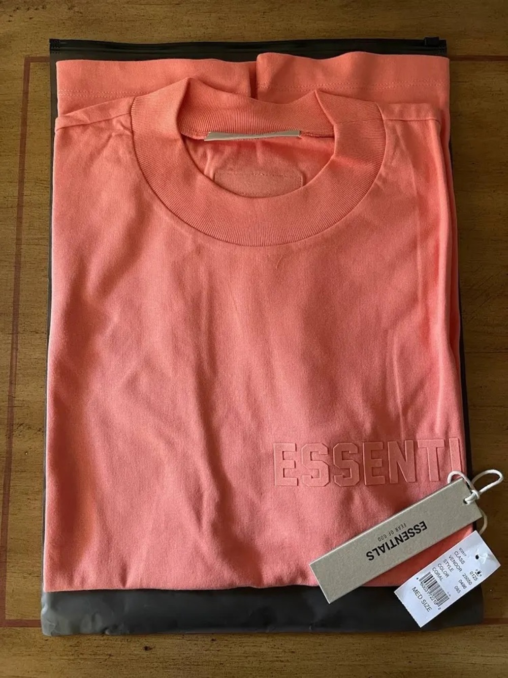 Essentials Coral Pink Embossed Logo Crewneck Sweatshirt